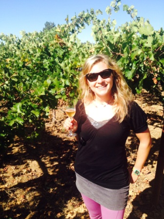 Erin Troy, Green Dream tour guide, toasts fall in the vineyard. 
