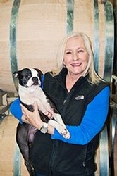 Napa Valley winemaker and her dog greet guests on a Green Dream Tour.