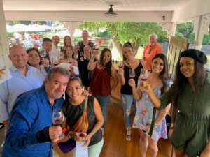 large group enjoying wine tour