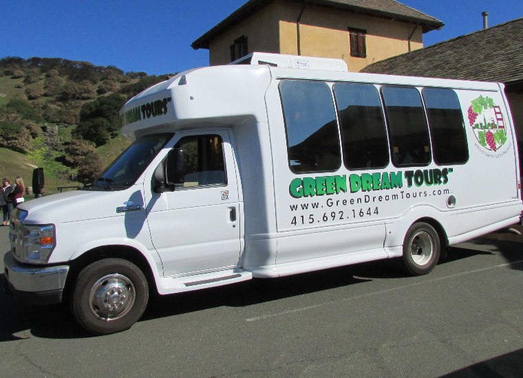 Green Dream Tours Limo Bus white exterior at winery
