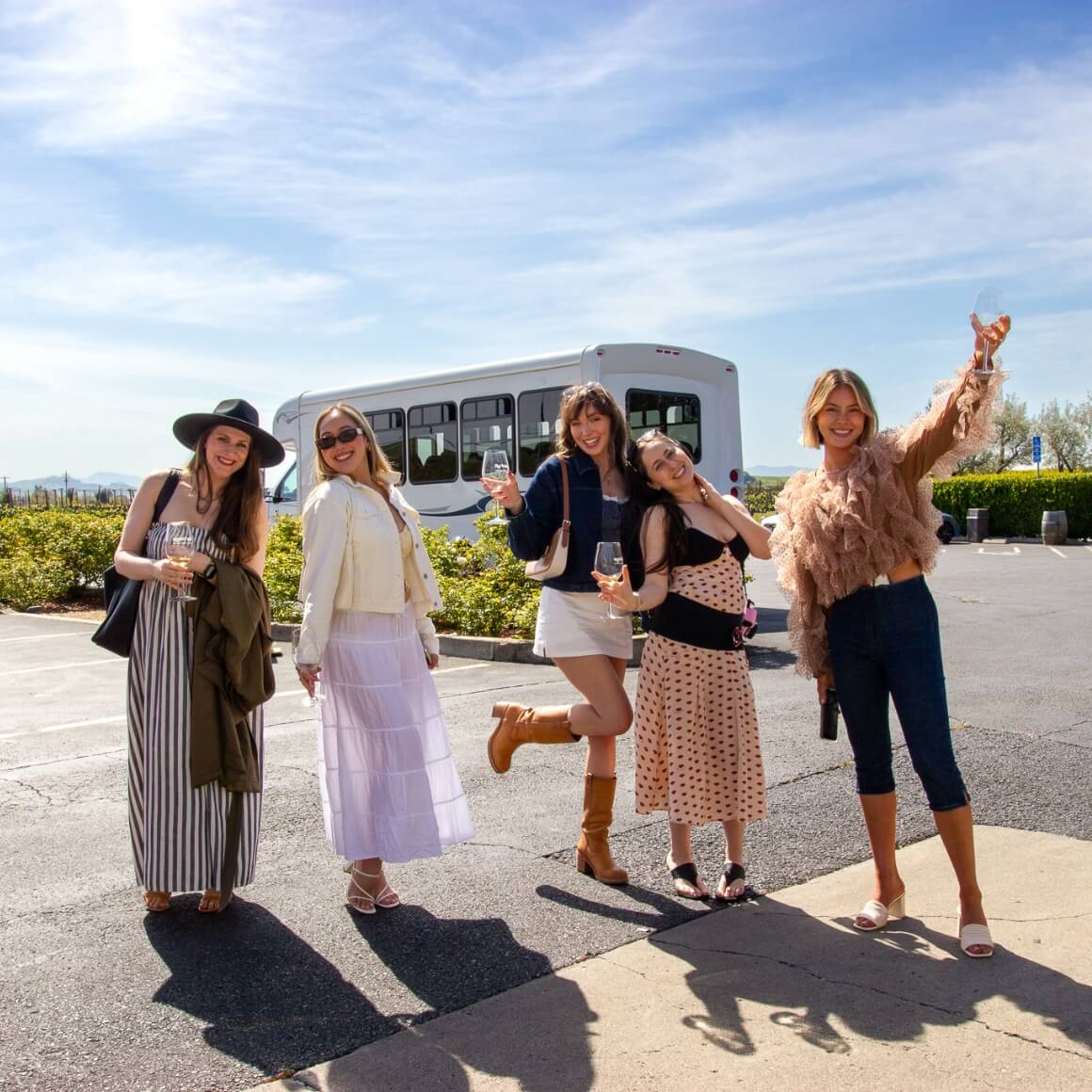 Friends enjoying wine tasting tour with transportation shuttle in Sonoma Valley